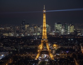View of the Eiffel Tower all lit up at night